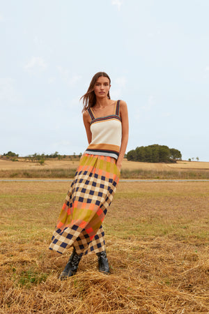 CONJUNTO CUADROS TOP Y FALDA AURA